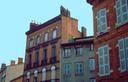 Toulouse is called the rose city for its old town filled with buildings in shades of red.